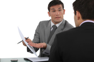 businessmen exchanging views during meeting