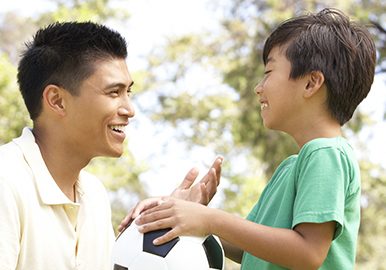 Senior couple meets with a friendly financial adviser.