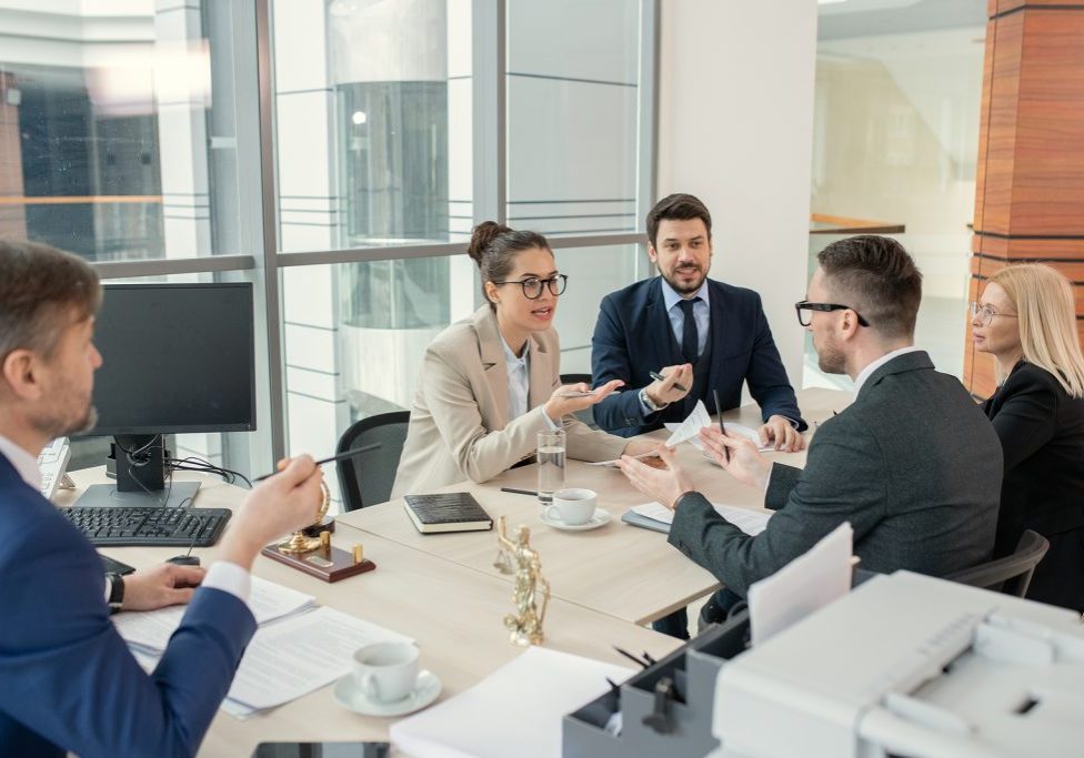 Group of business people planning work together and discussing together at the table during business meeting at office