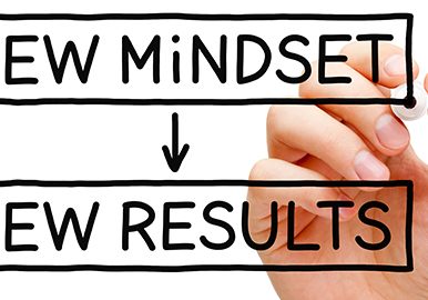 Hand writing Simplify with blue marker on transparent wipe board isolated on white.