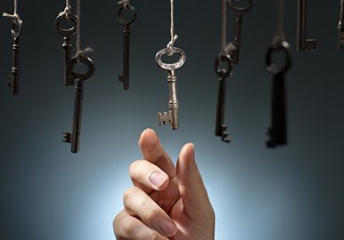 Senior couple meets with a friendly financial adviser.